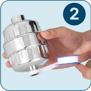 Envuelve cinta de teflón alrededor del brazo de la ducha.